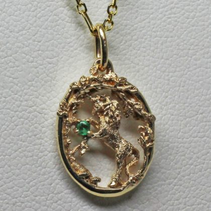 Golden Unicorn emerald pendant in 14K