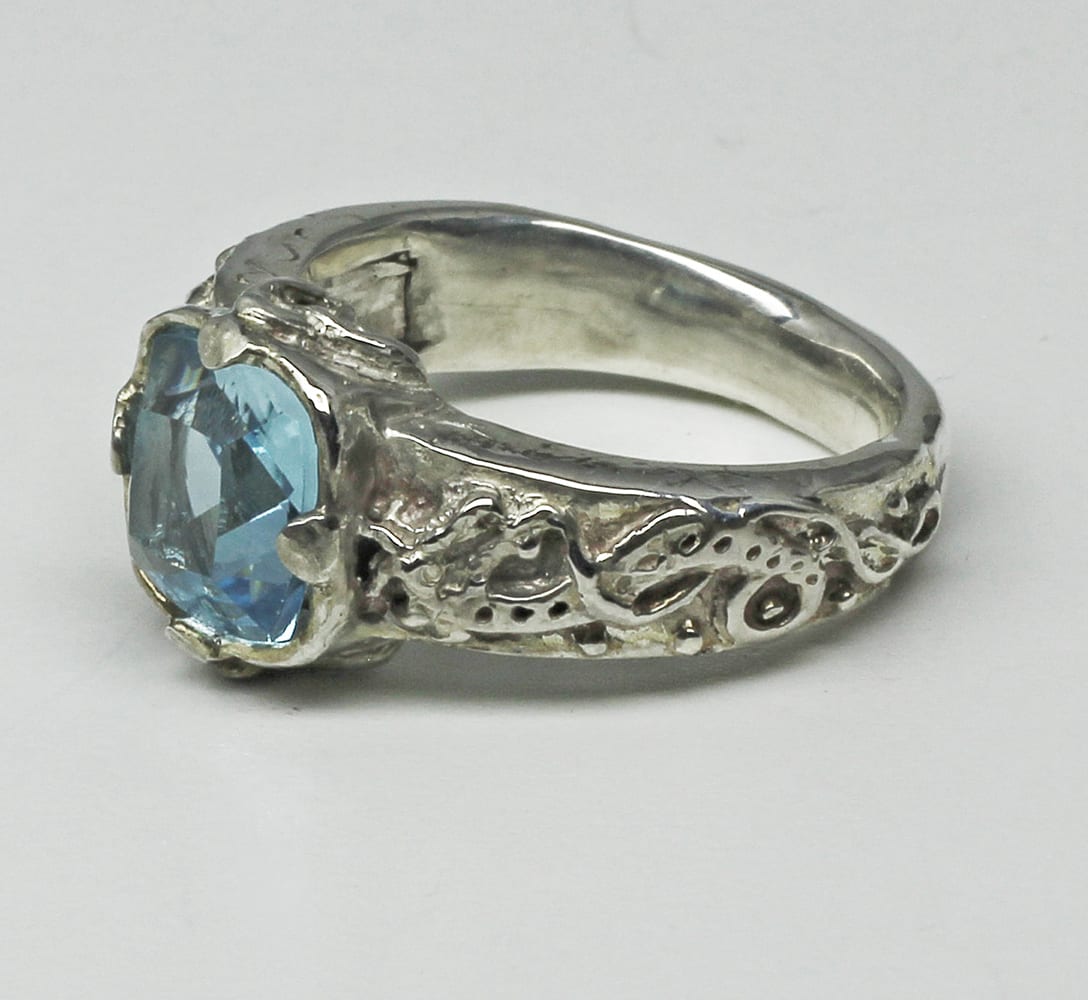 Blue Topaz Dragon Ring, Norse dragons carved on each side.