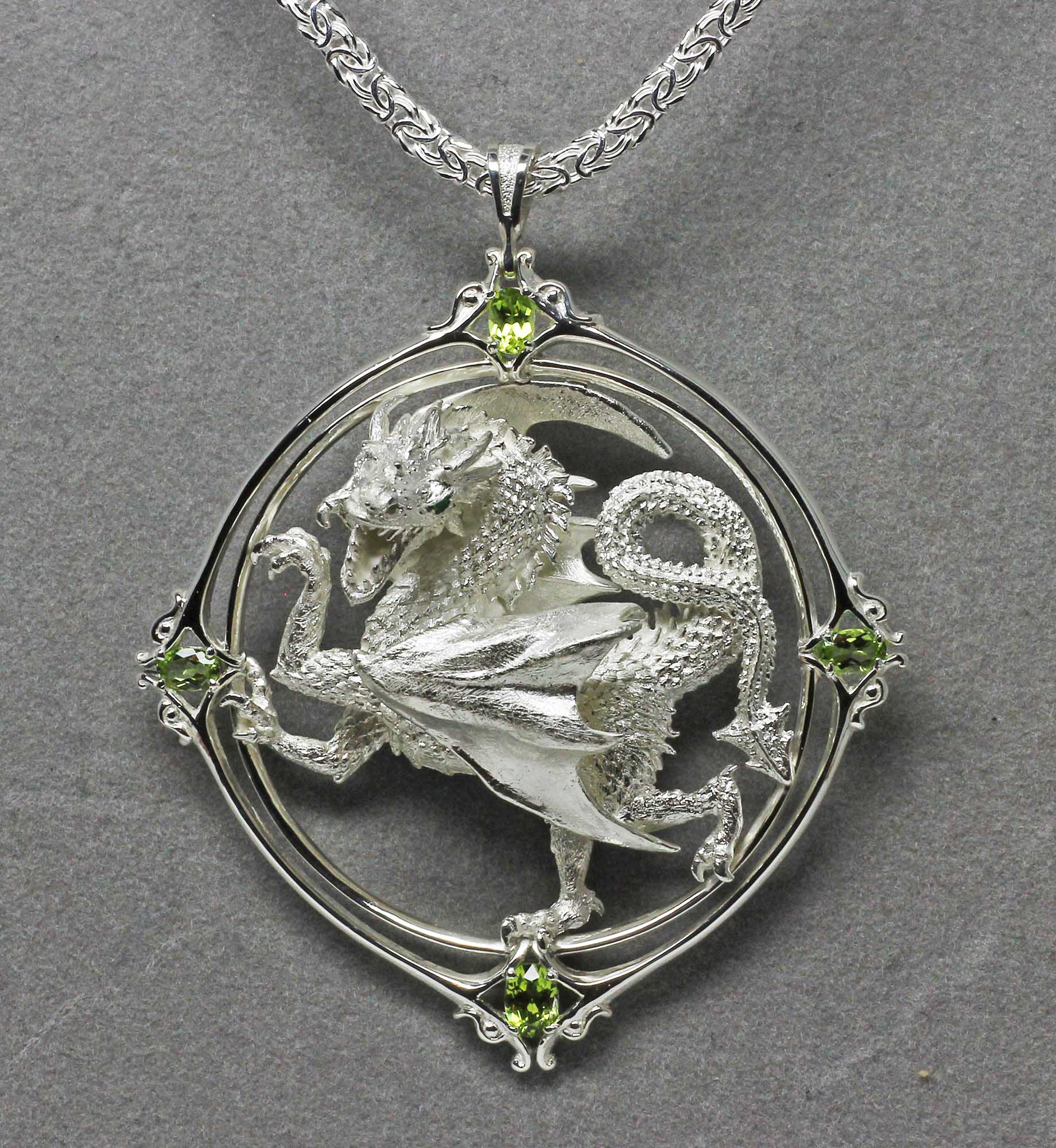 Dragon Peridot Pendant Silver with Emerald Eyes.