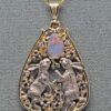 Dancing White Rabbits Pendant with black opal
