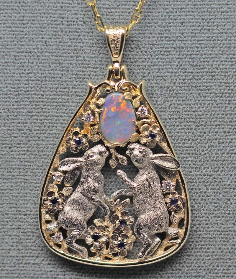 Dancing White Rabbits Pendant with black opal