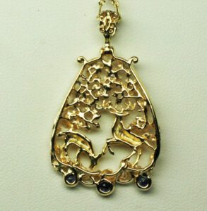 Highland Deer gold Pendant in 14K and 18K yellow gold with  fine diamonds and sapphires
