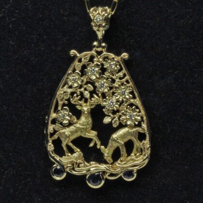 Highland deer gold pendant