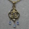 Mackintosh sapphire and topaz pendant,14K, by Suzan