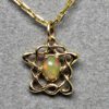 Petite Celtic opal pendant in 14K,