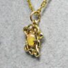 Petite Celtic opal pendant Details: The pendant was first built up and sculpted in wax by Suzan, it was then cast in 14K gold and finished. It is approximately 15 X 15mm in size not counting its bale. The opal is an Ethiopian stone that is approximately 6 X 5 mm.