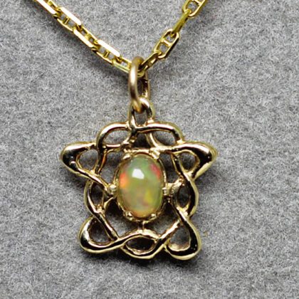 Petite Celtic opal pendant in 14K,