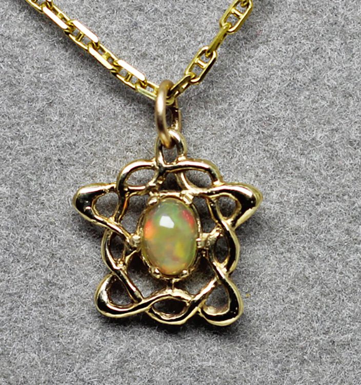 Petite Celtic opal pendant in 14K,